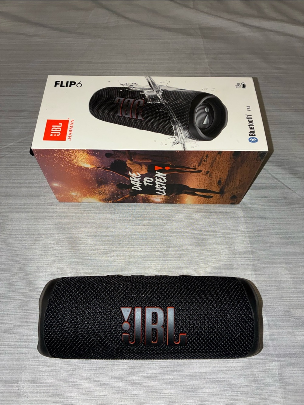 JBL Flip 6 Portable Bluetooth Speaker — Black with Red Accent